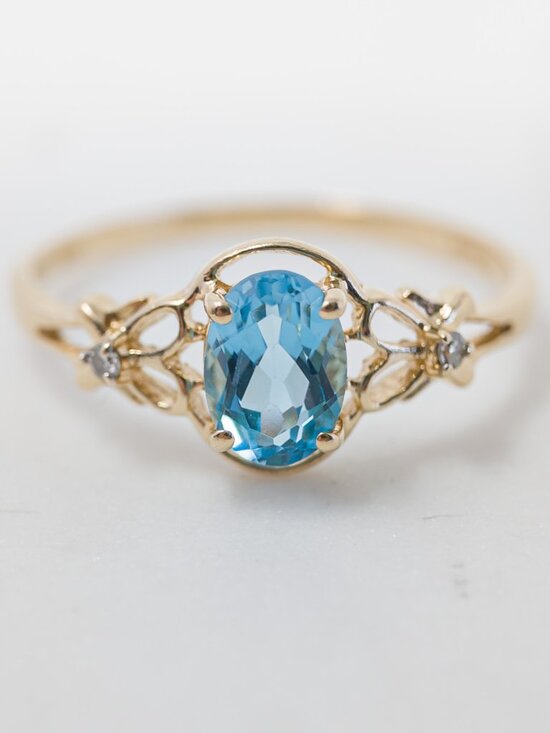 Imperial Gold Co. Jewelry - 14k Gold Oval Blue Topaz Ring with Diamond Accents